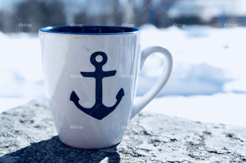 A cup with anchor in it on sunshine 