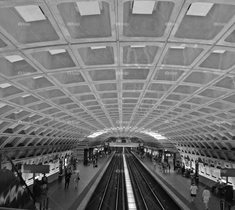 
Symmetry -  Subway, underground railway system used to transport large numbers of passengers within urban and suburban symmetry