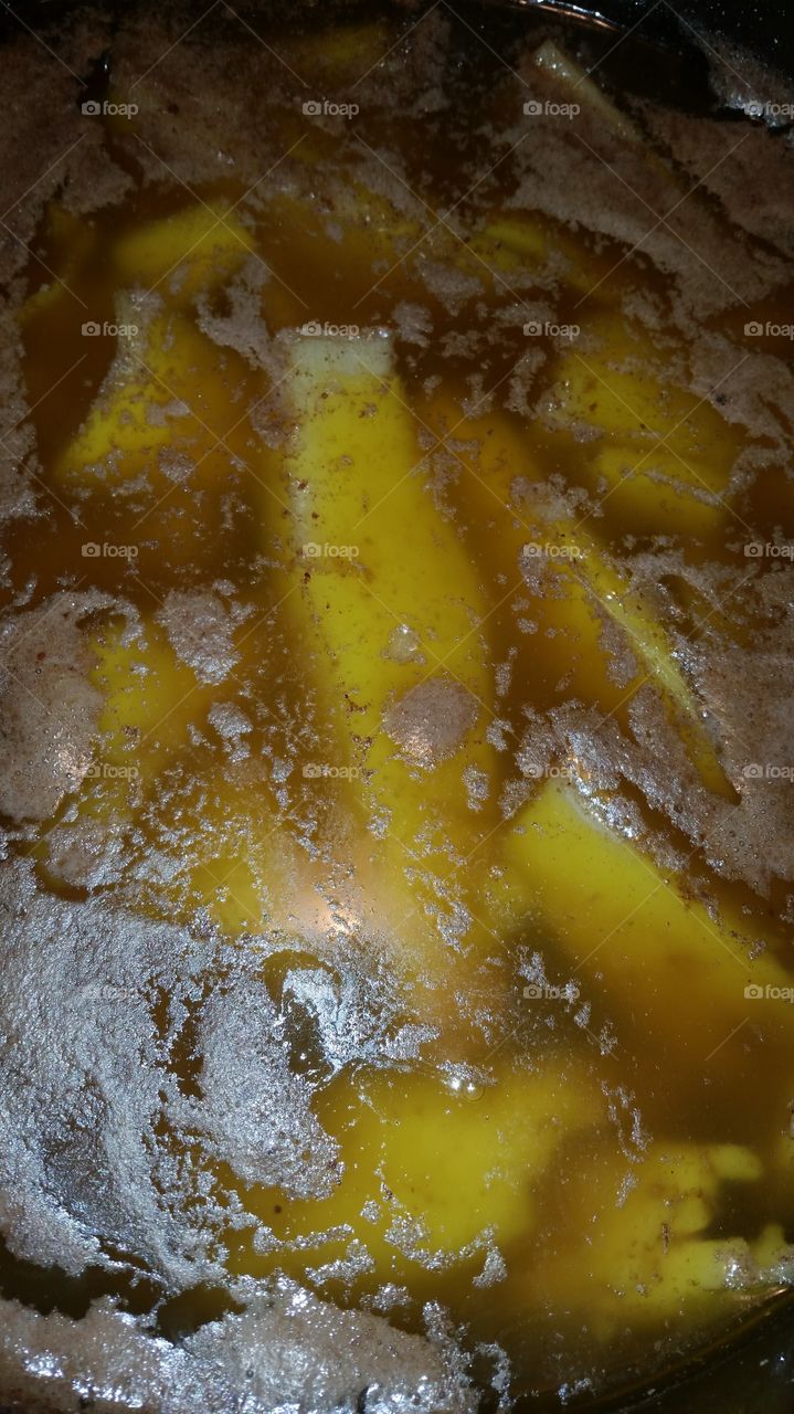 Candied yams simmering