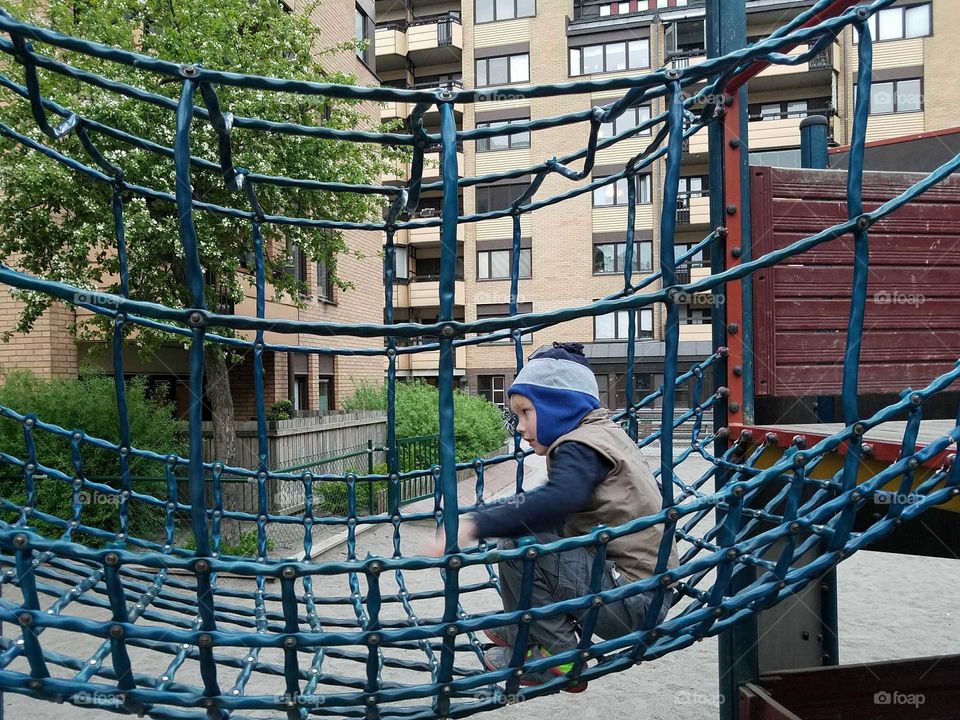 boy playing in playground