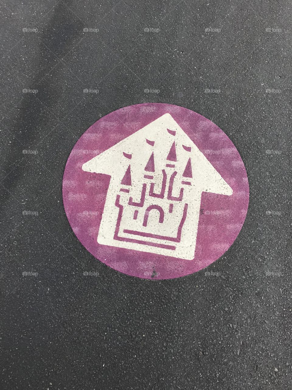 The "walk this way" symbol at the Magic Kingdom. 