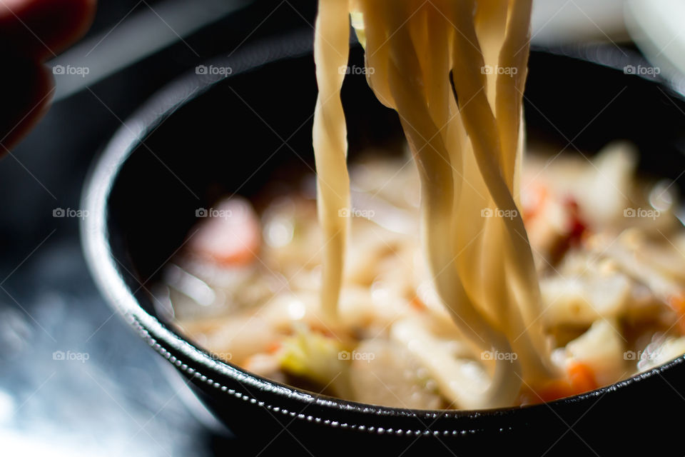 Eating udon noodles.Japan real food/takeaway/cheap food