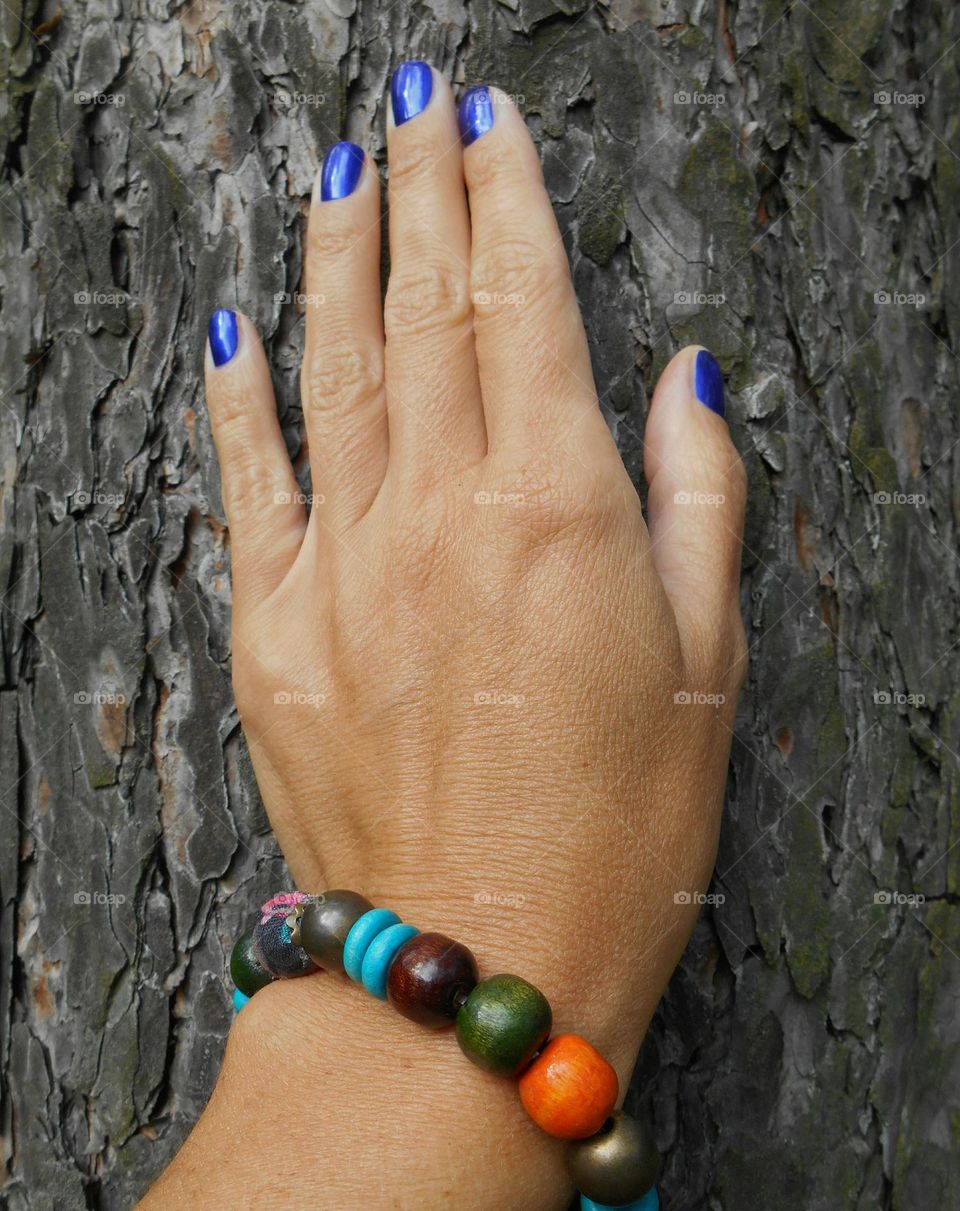 female hand with colour bracelet, beautiful accessories woman