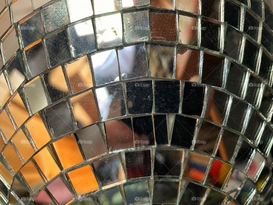 Close up of small mirrors on a dico ball 