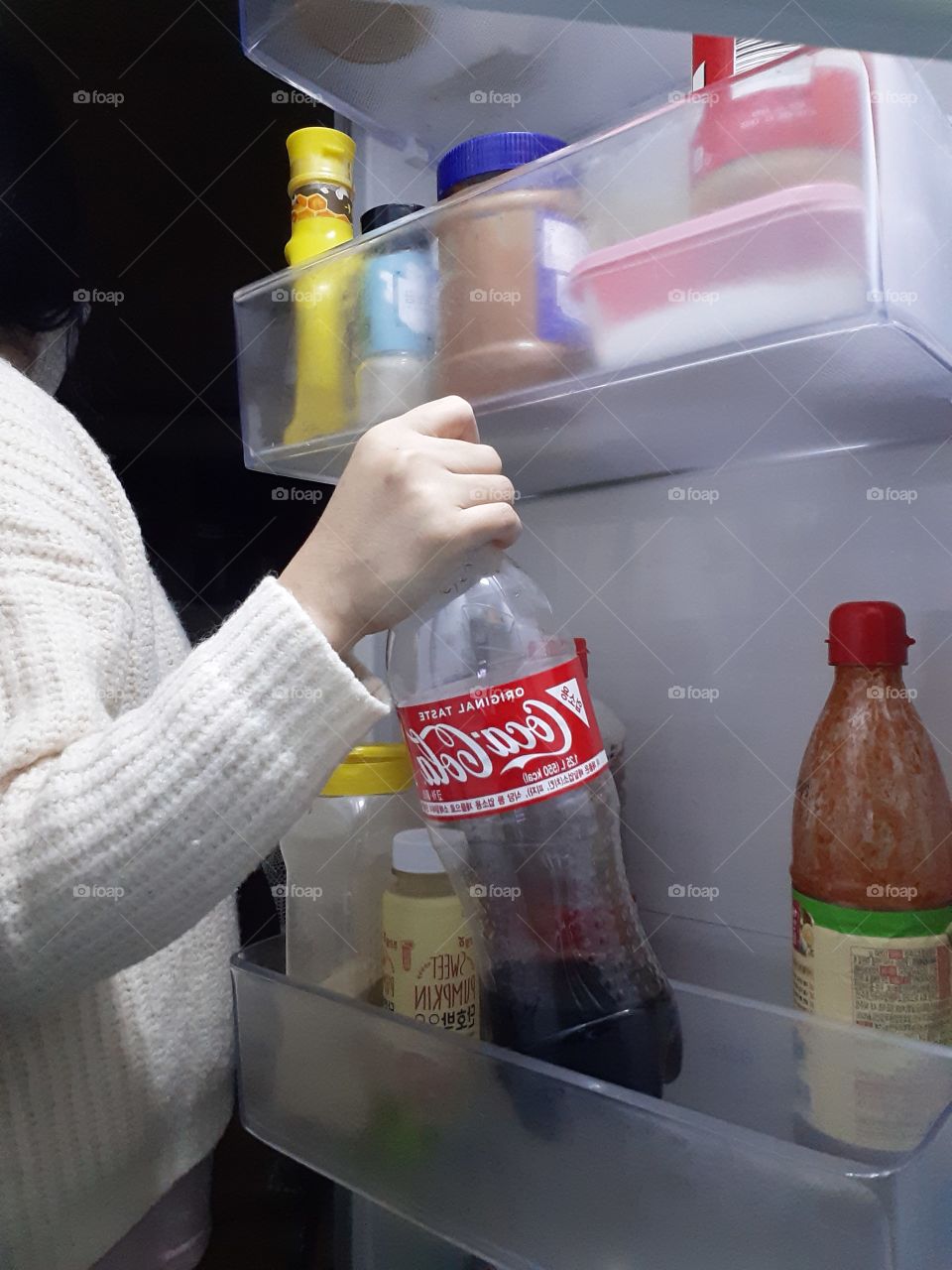 refrigerator will never be bored with coca cola on it. most of time it keeps opening for one reason, ""coca cola drinks""