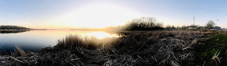 Gorgeous night in this small town beach area with sun setting below the horizon. 