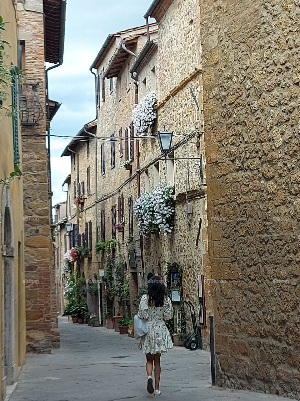 summer in Italy, old village and girl