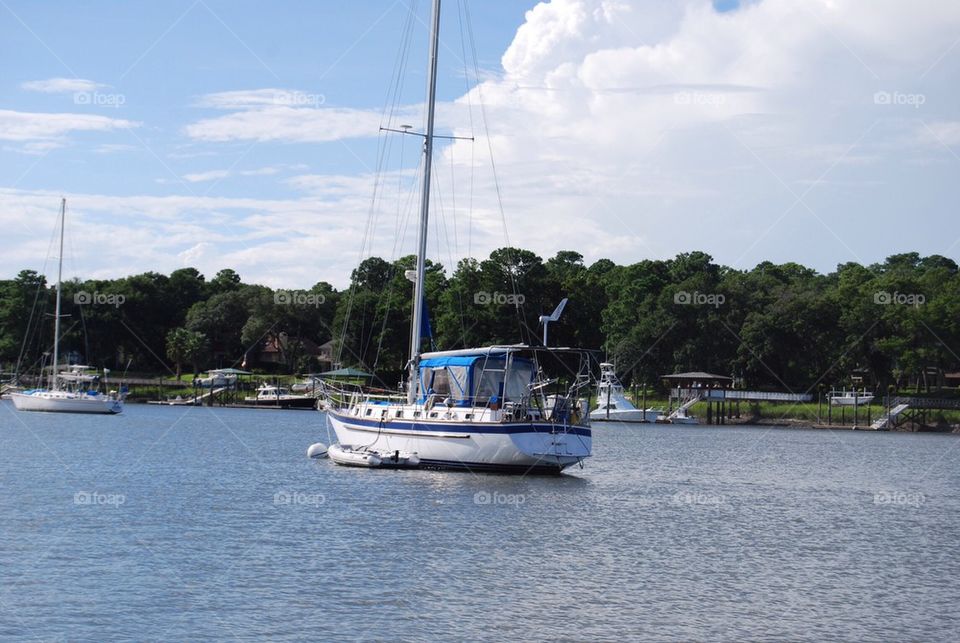 Sail boat water clouds