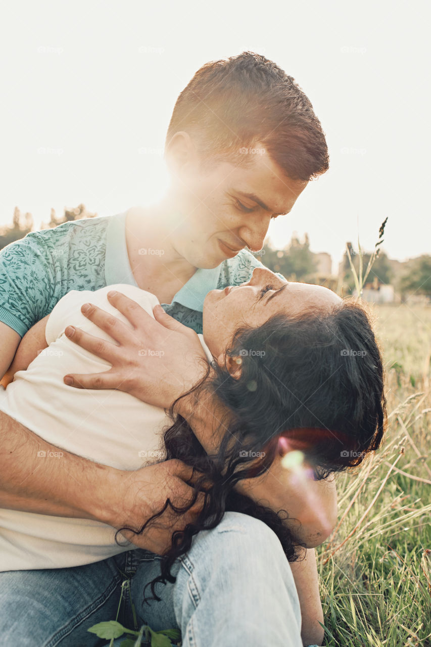 Couple in love at the sunset