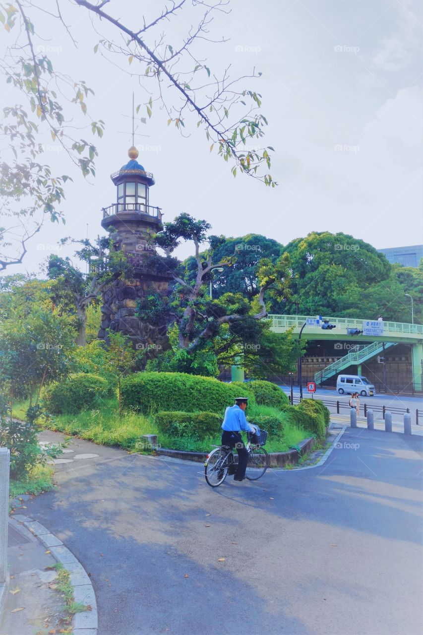 Postcard from Japan: Even a policeman can ride a bicycle. That's what you call a healthy lifestyle!