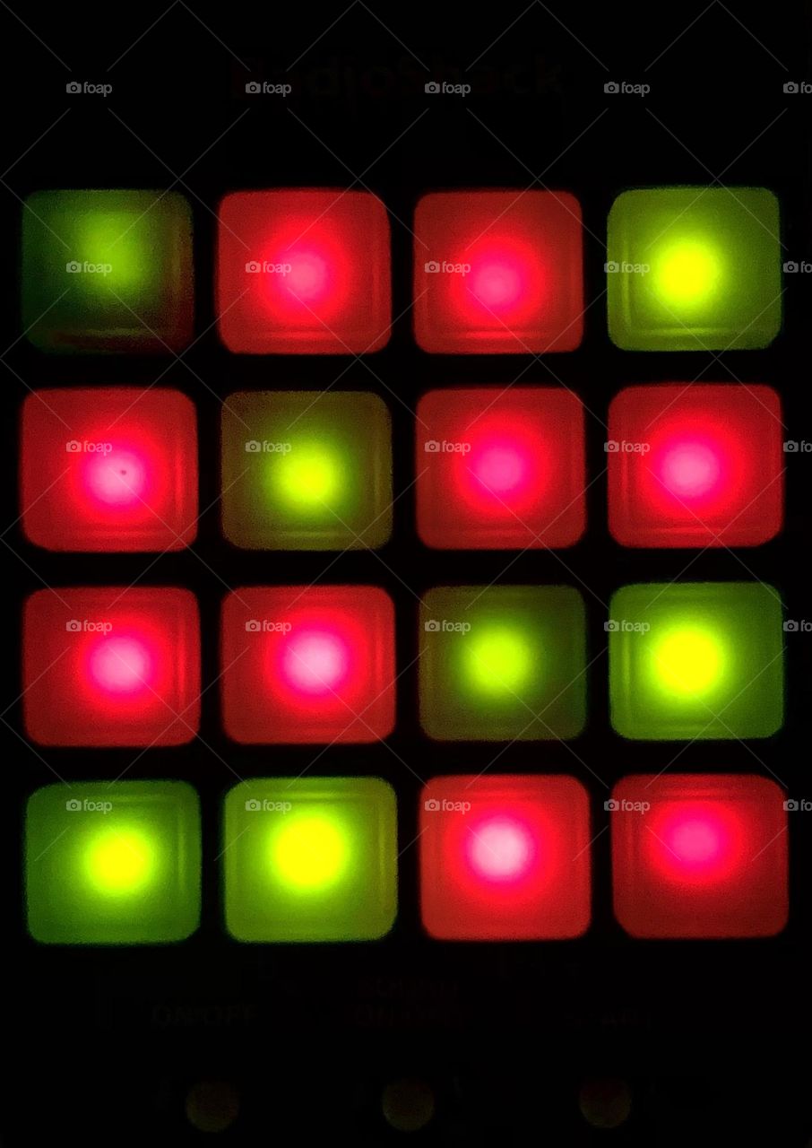 Square with red and lime green lights old electronic memory game 