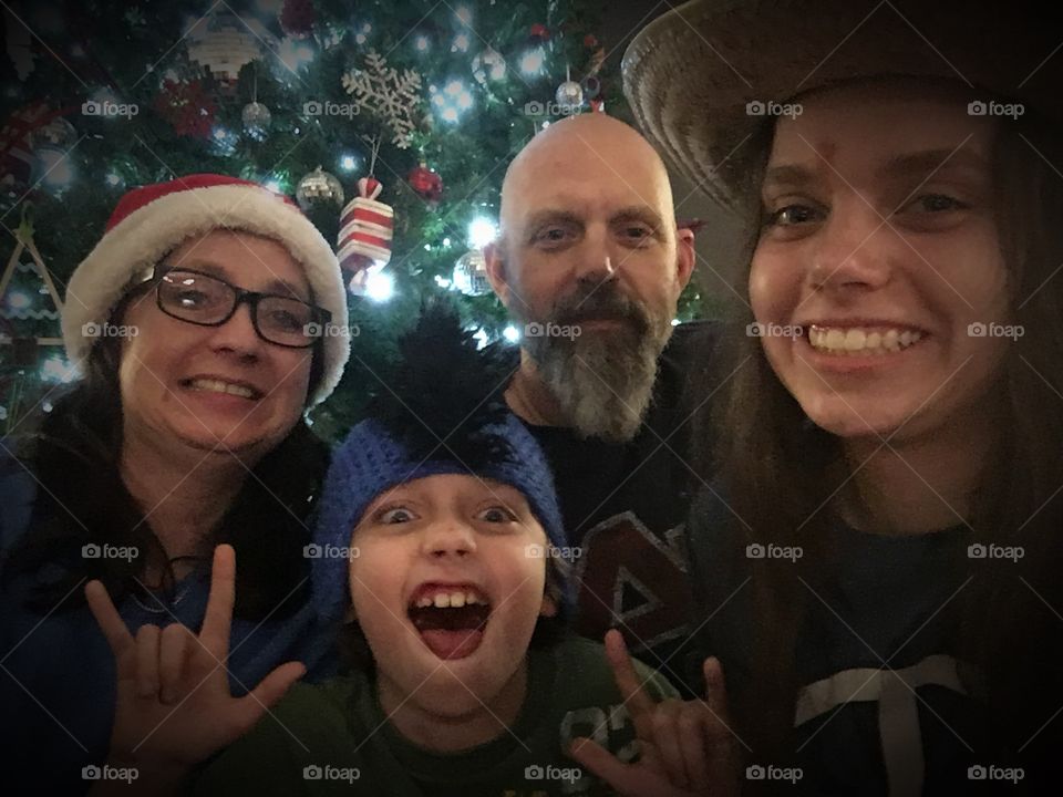 Portrait of a smiling family enjoying in christmas