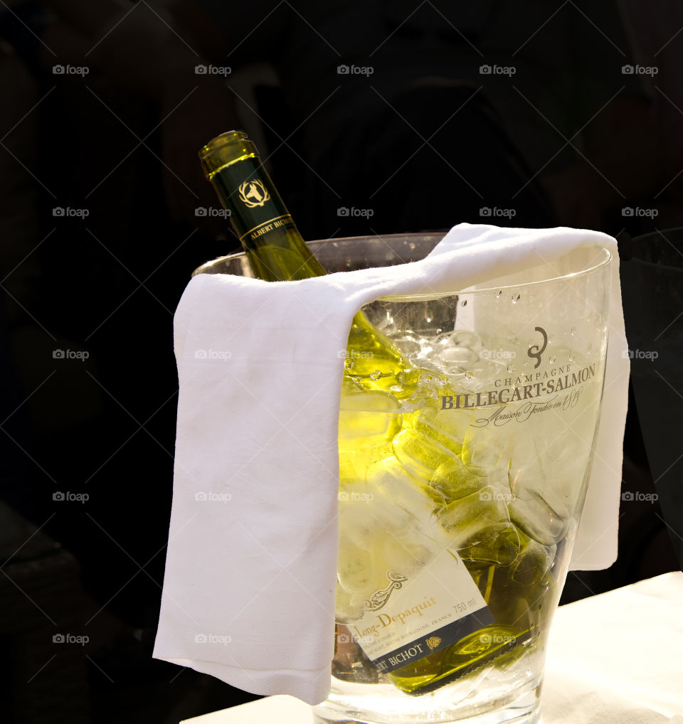 Cold bottle of white wine. 