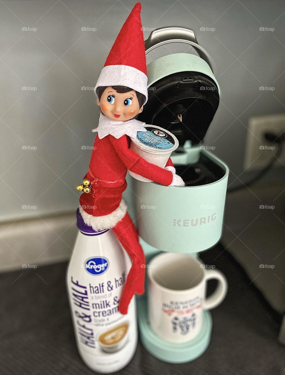 Elf on a shelf makes coffee, elf on a shelf makes a Keurig cup of coffee, giving mommy caffeine 