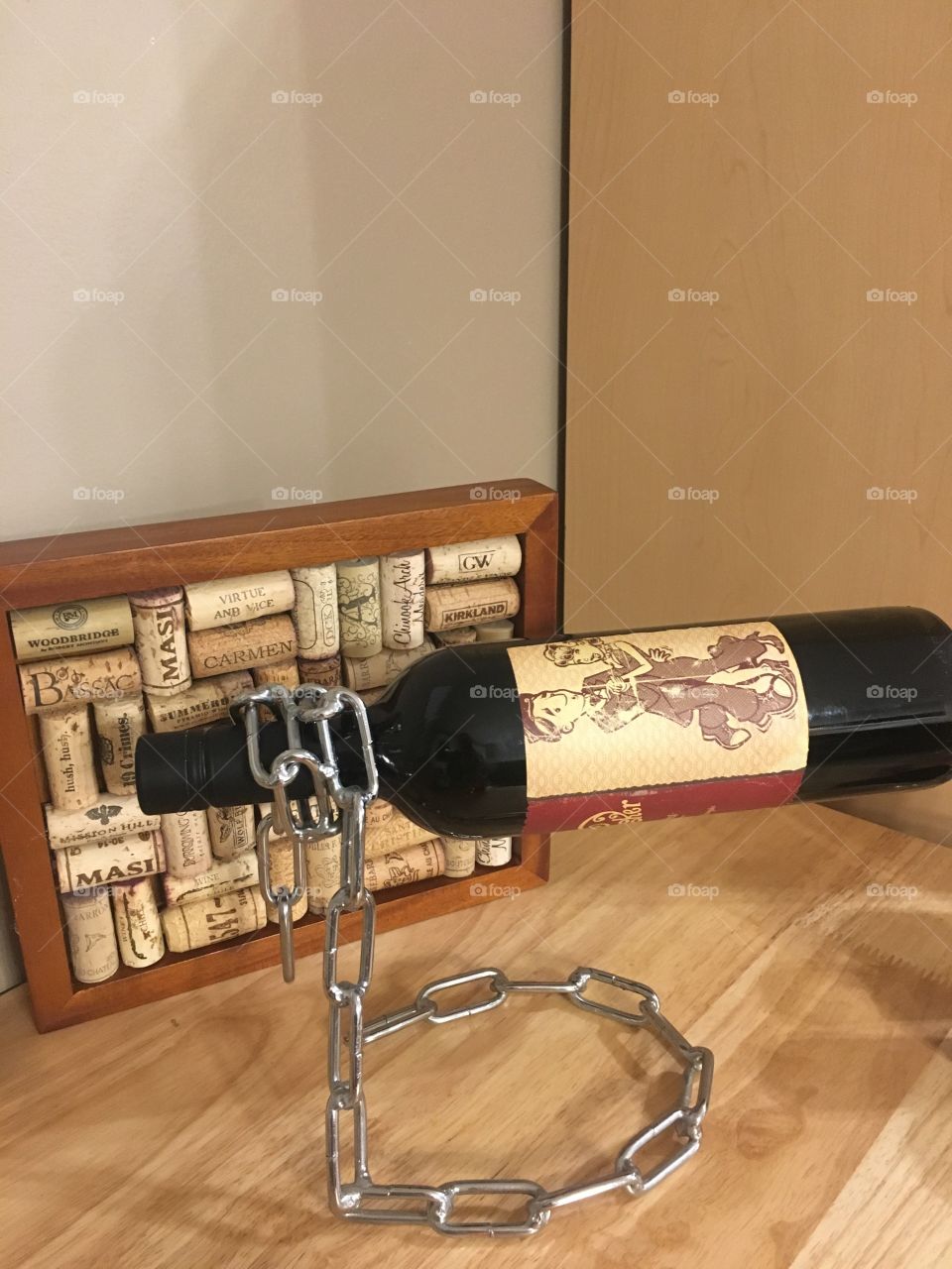 Wine in a holder with cork trivet 