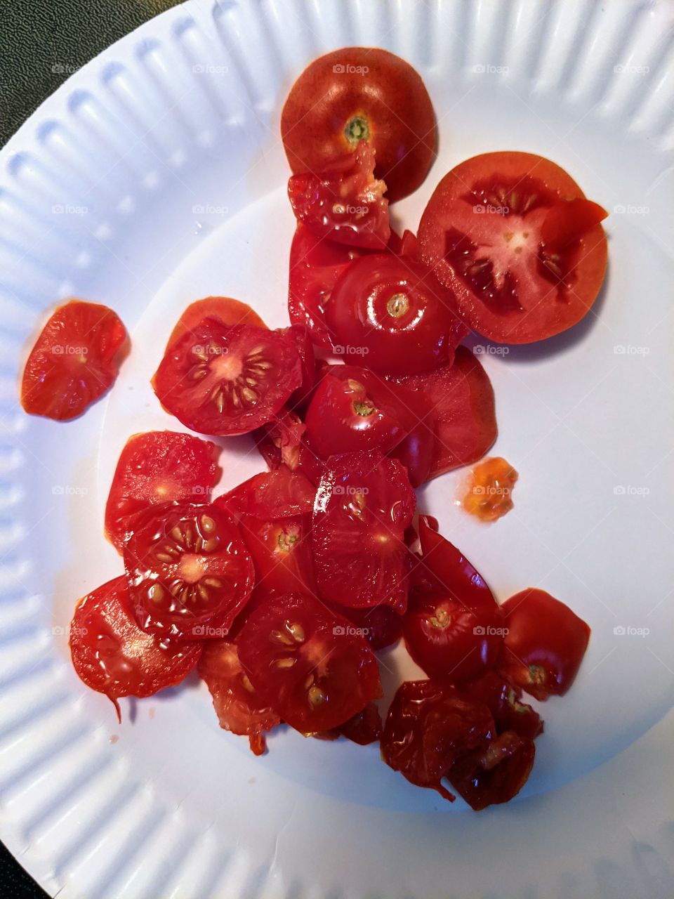 Silly Red Tomato face in a cut red tomato