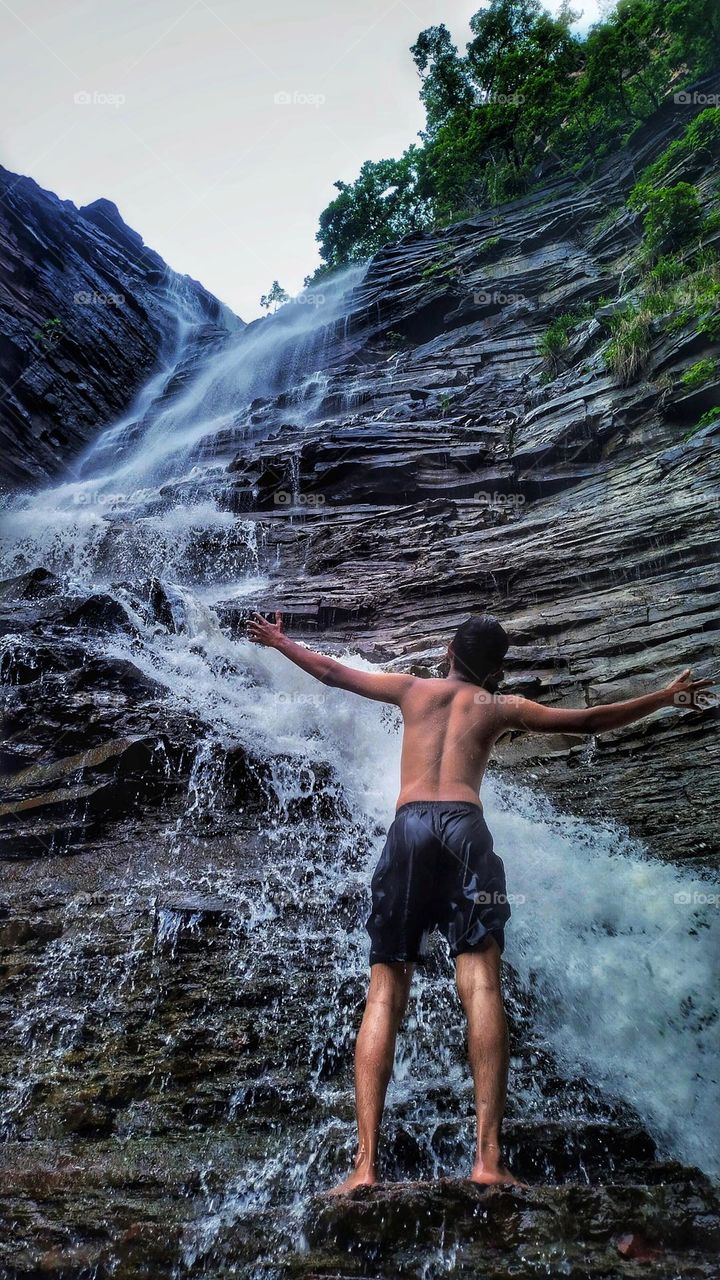 Summer vacation with beautiful waterfall