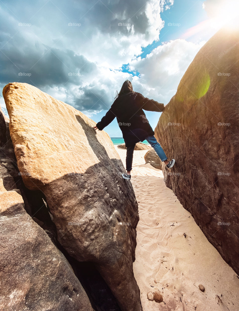 Girl between rocks