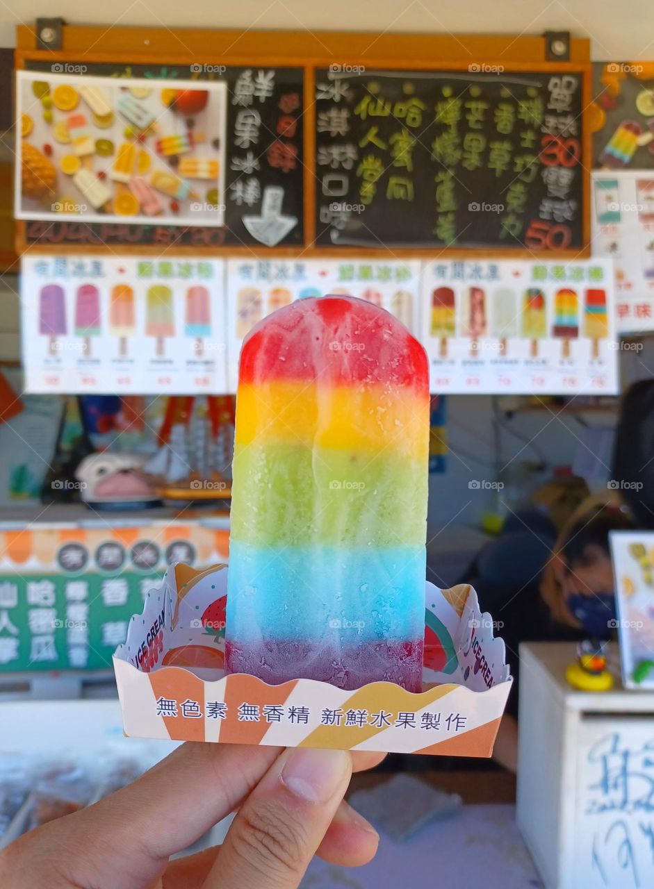 A nice summer treat -- rainbow-colored popsicle