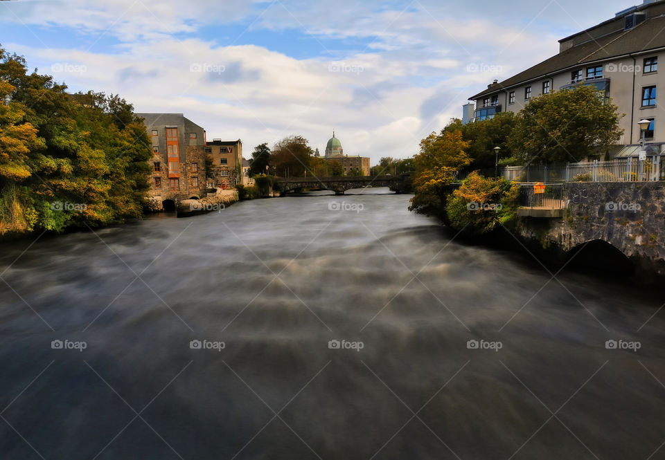 River Corrib flow and the Galway cathedral in the background