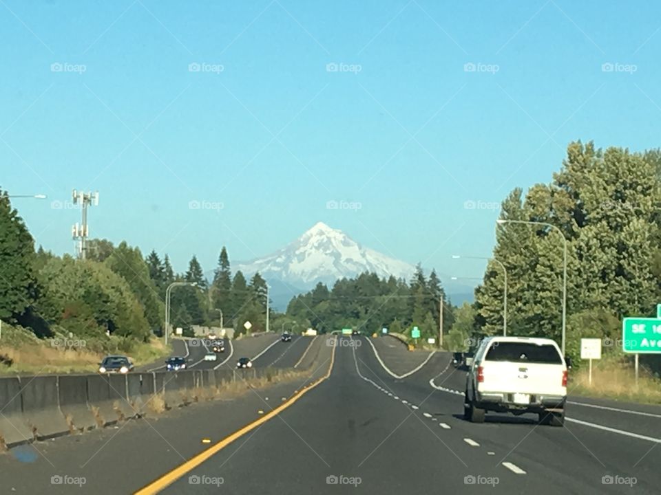 Traveling on the interstate with Mount Hood in the distance 