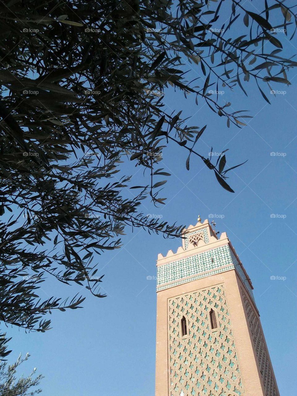 Splendid and magic minaret of a mosque at marrakech city in Morocco.