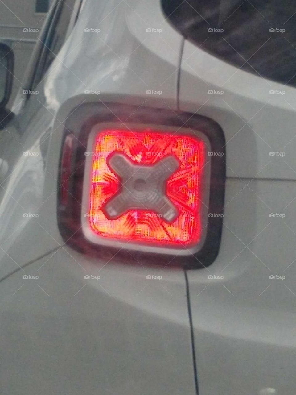 Thought this car light 🚘 had a design that would make an interesting photo 🤳🏾⏹️x.