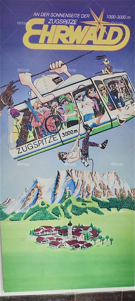 This is a cartoon of the “Seilbahn Zugspitze”, an aerial tramway from “Lake Eibsee” below to 2950 m just beneath the summit of the “Zugspitze” at 2962 m. The village is “Garmisch-Partenkirchen” in the Bavarian “Alps”. 2024. Hypnotic Productions