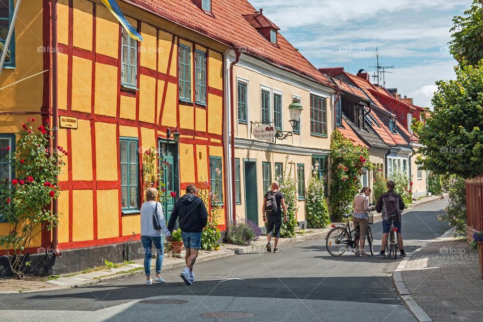 Pedestrians and cyclists on Lilla Västergatan in Ystad, Österlen, Sweden