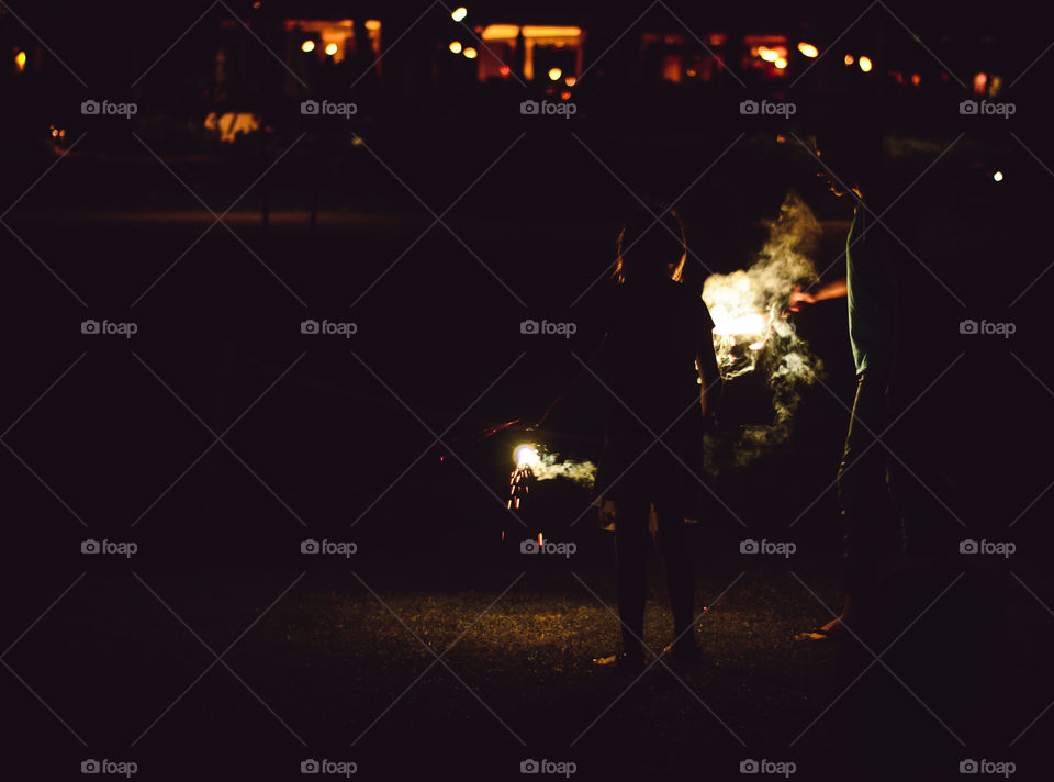 Sparklers and smoke on the Fourth of July 