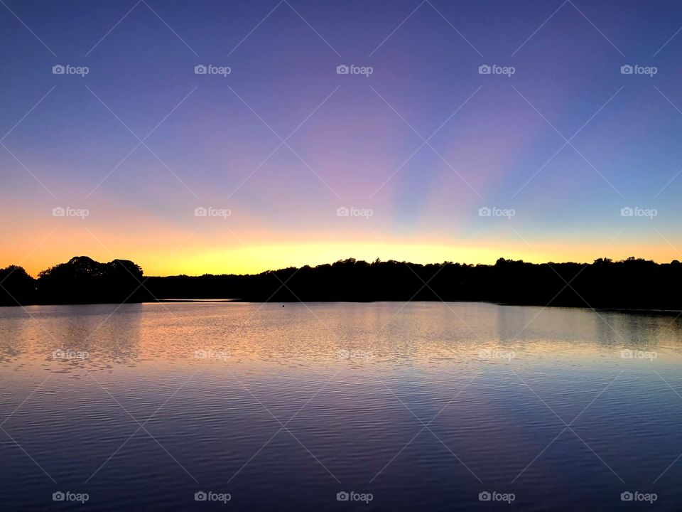 Pink rays at sunset 