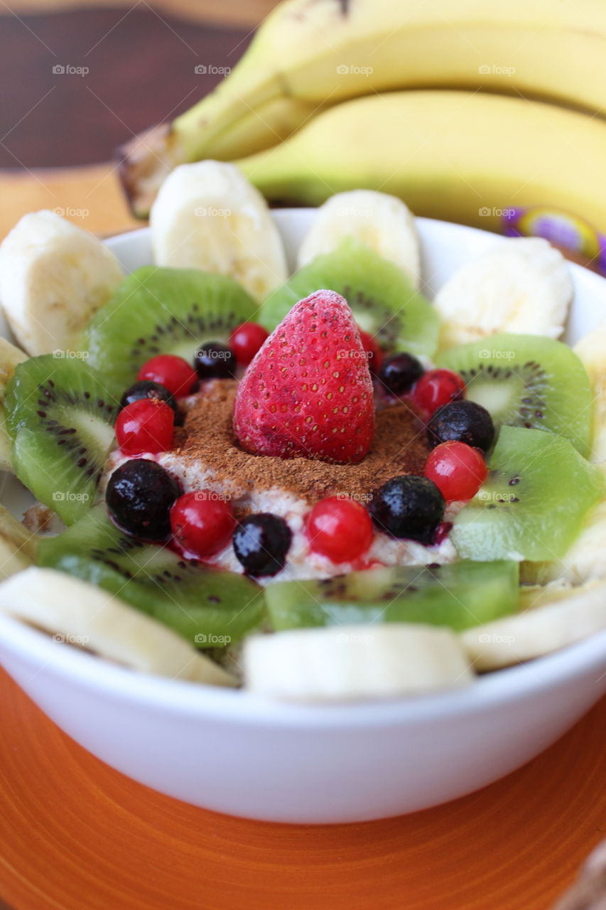 Breakfast with banana and berries