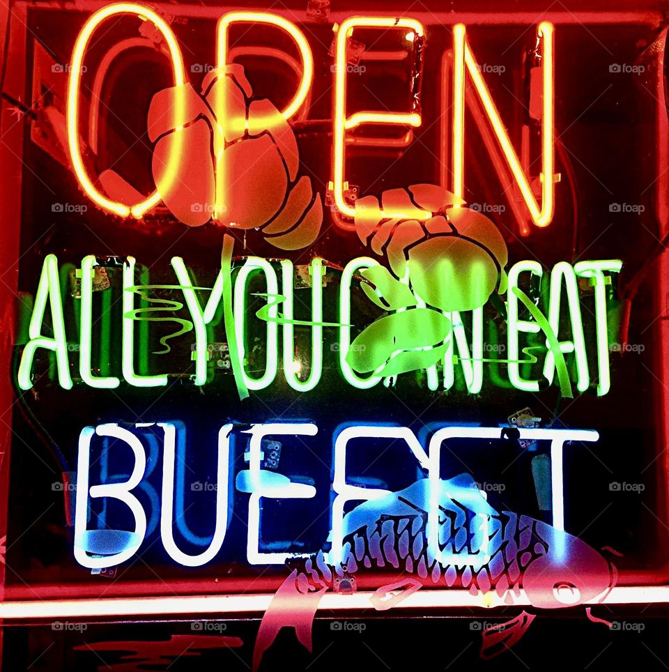 Multicolored glowing neon sign.