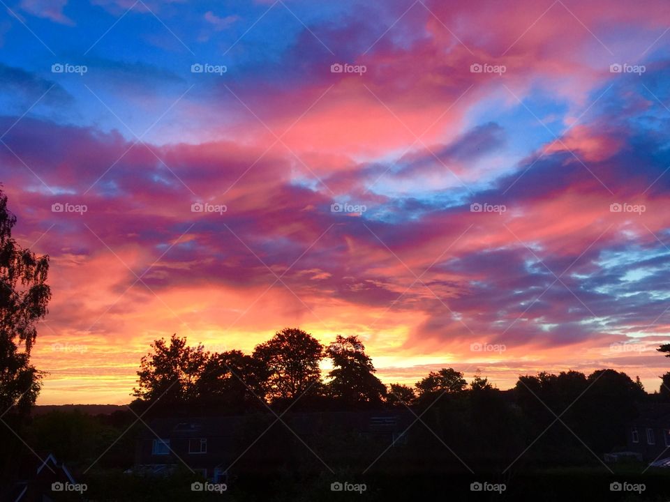 Colourful Sunrise over Horsham. Taken just after 4.30 am on a hazy Monday morning. Heatwave just about to hit Southern England.  