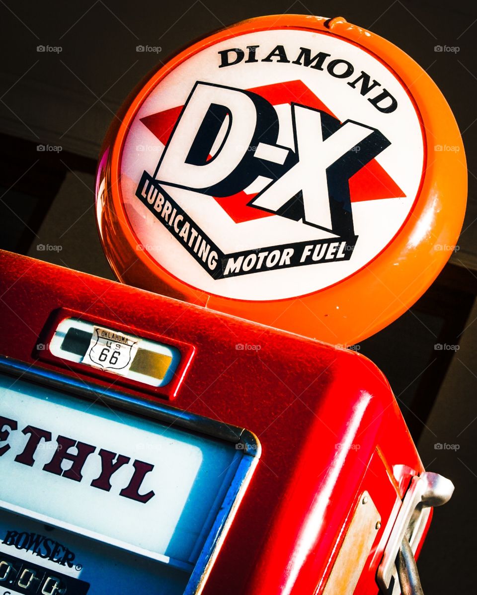 Vintage glass globe gas pump for the Diamond DX Brand found along an old stretch of old Route 66. 