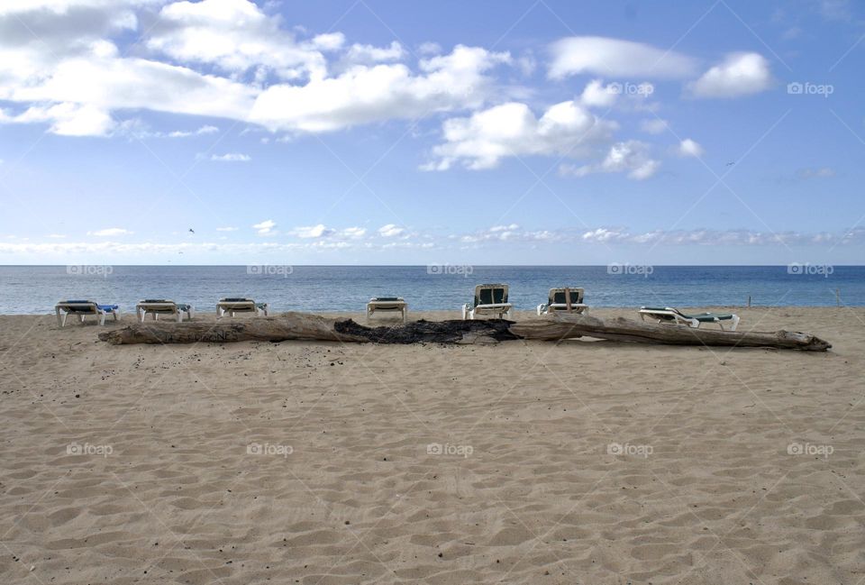 Inviting beach chairs lined up on Lo De Marcos beach.