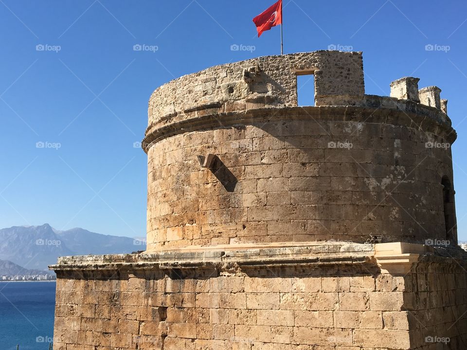 Antalya Old Tower with Turkish flag