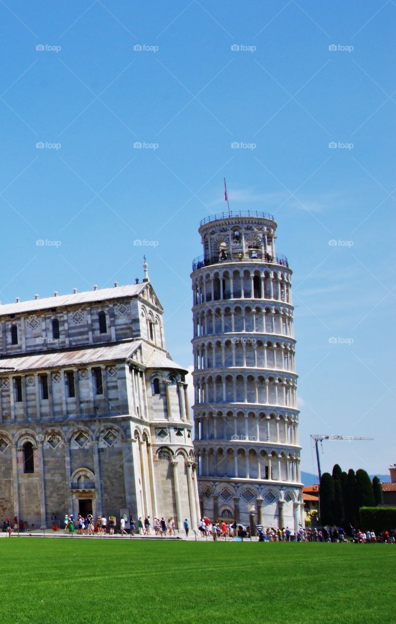 Leaning tower of pisa with tourist
