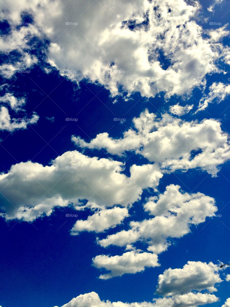 clouds against a blue sky