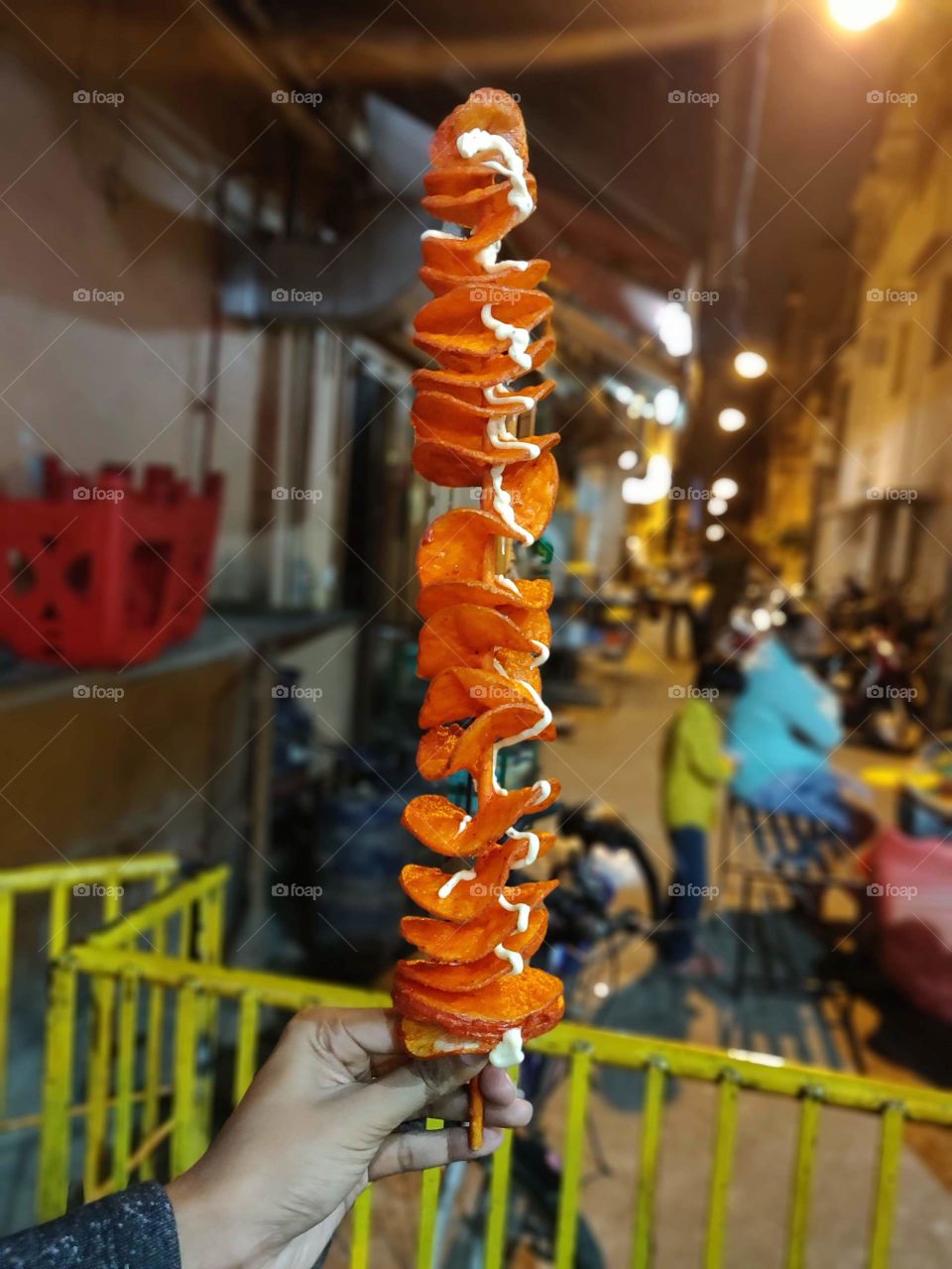 ever tried potato twister? we'll go ahead and try the yummy long stick of potato twister from the streets of Bangalore..🙂🙂😋