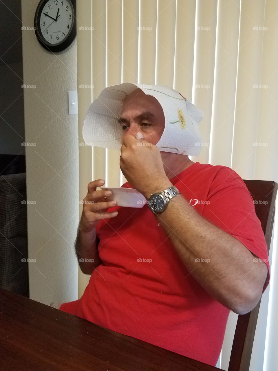 Silly man with napkin on his head