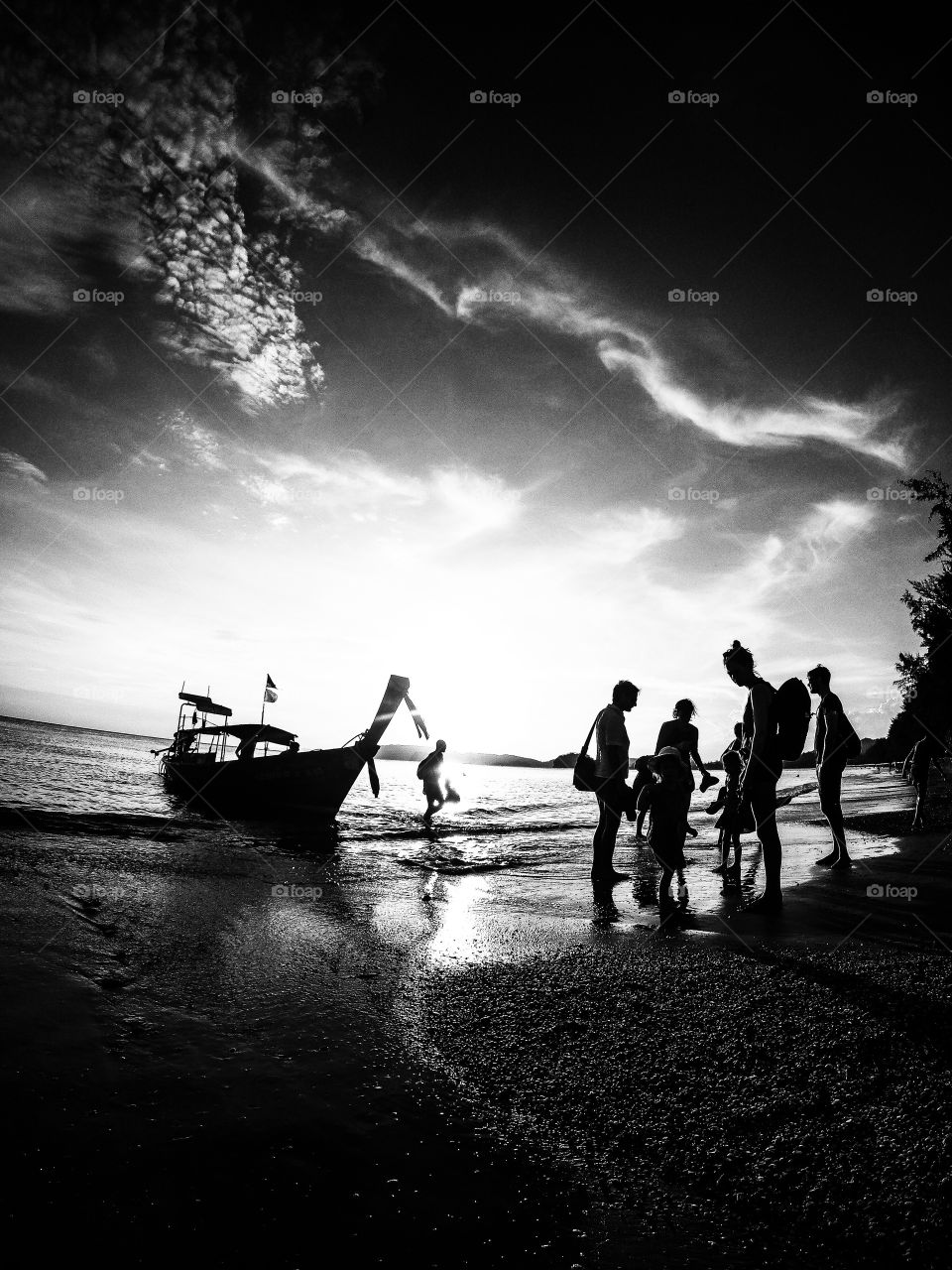 Disembarking A Long Tailed Boat At Nopharathara Beach In Thailand...x