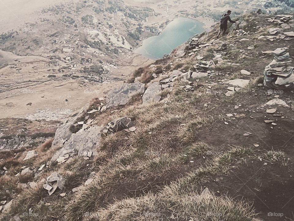 Distant view of hiker on mountain