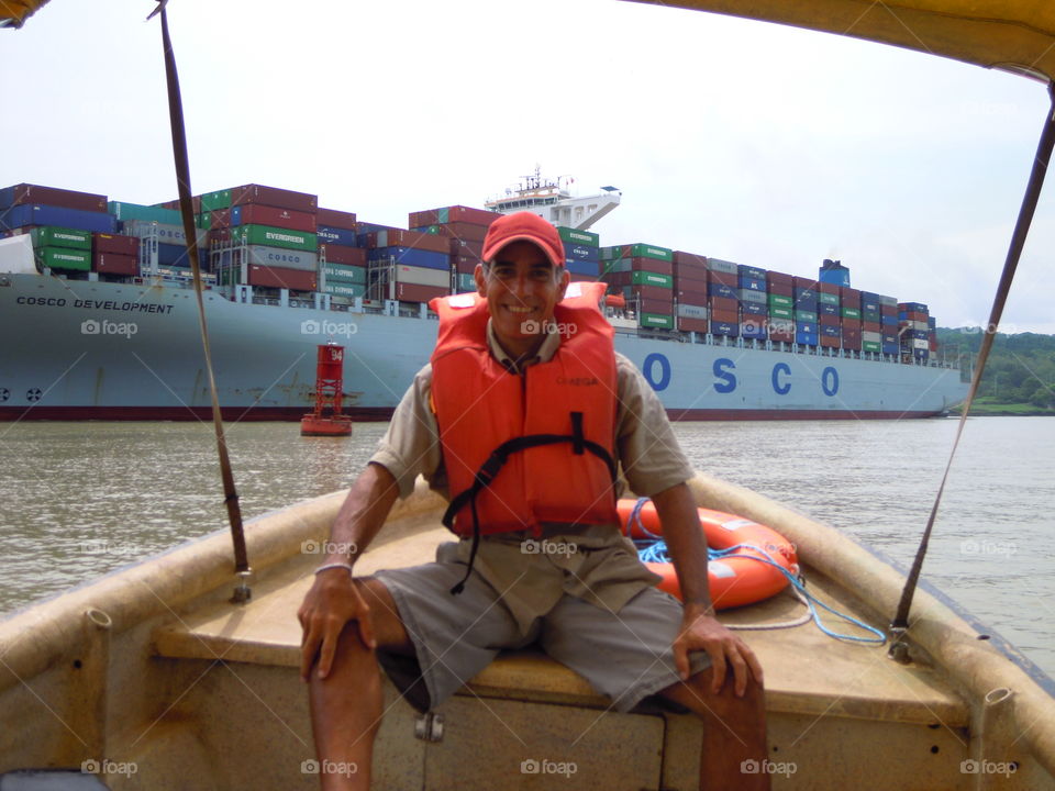 Sailing in the Panama Canal very close to the giant Cosco Developmemt