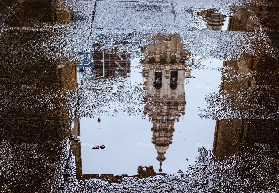 Santiago de Compostela cathedral reflected in a puddle