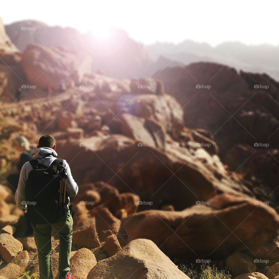 Hiking in the mountains at sunrise 