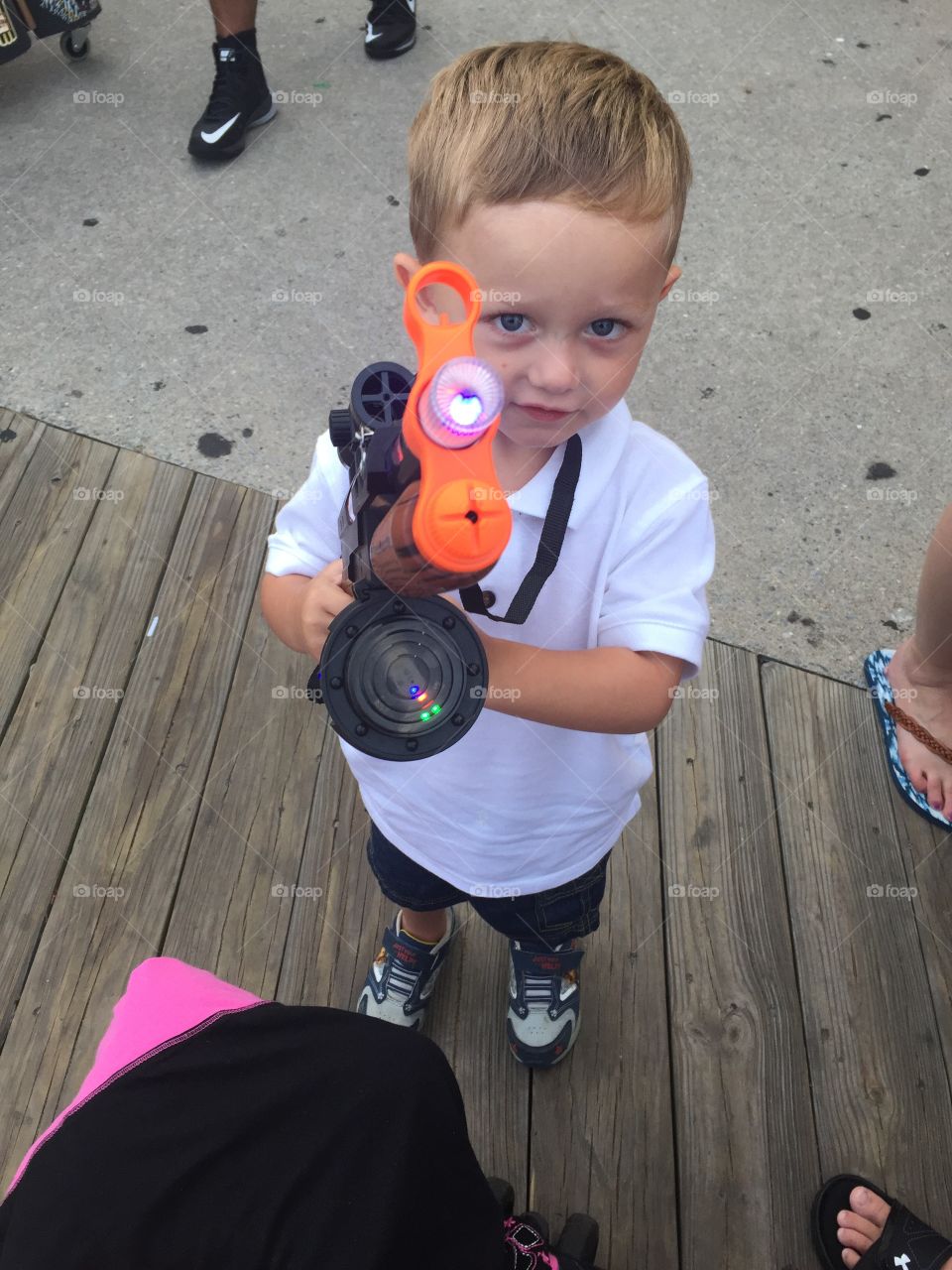 Boy holding gun