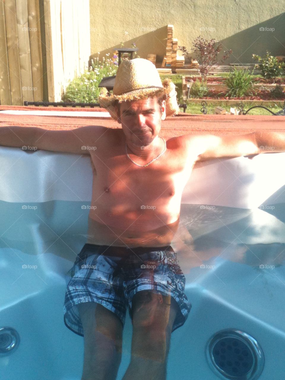 Cowboy in hot tub