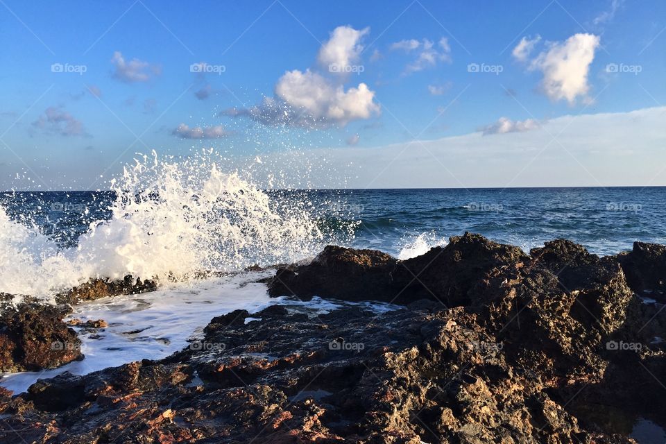 Waves splashing against a rocky shore