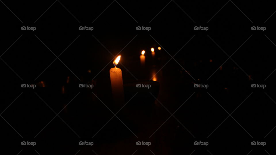 simple candle lights in the dark